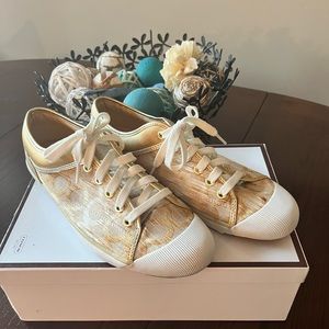 Size 11 Coach casual tennis shoes in great condition.